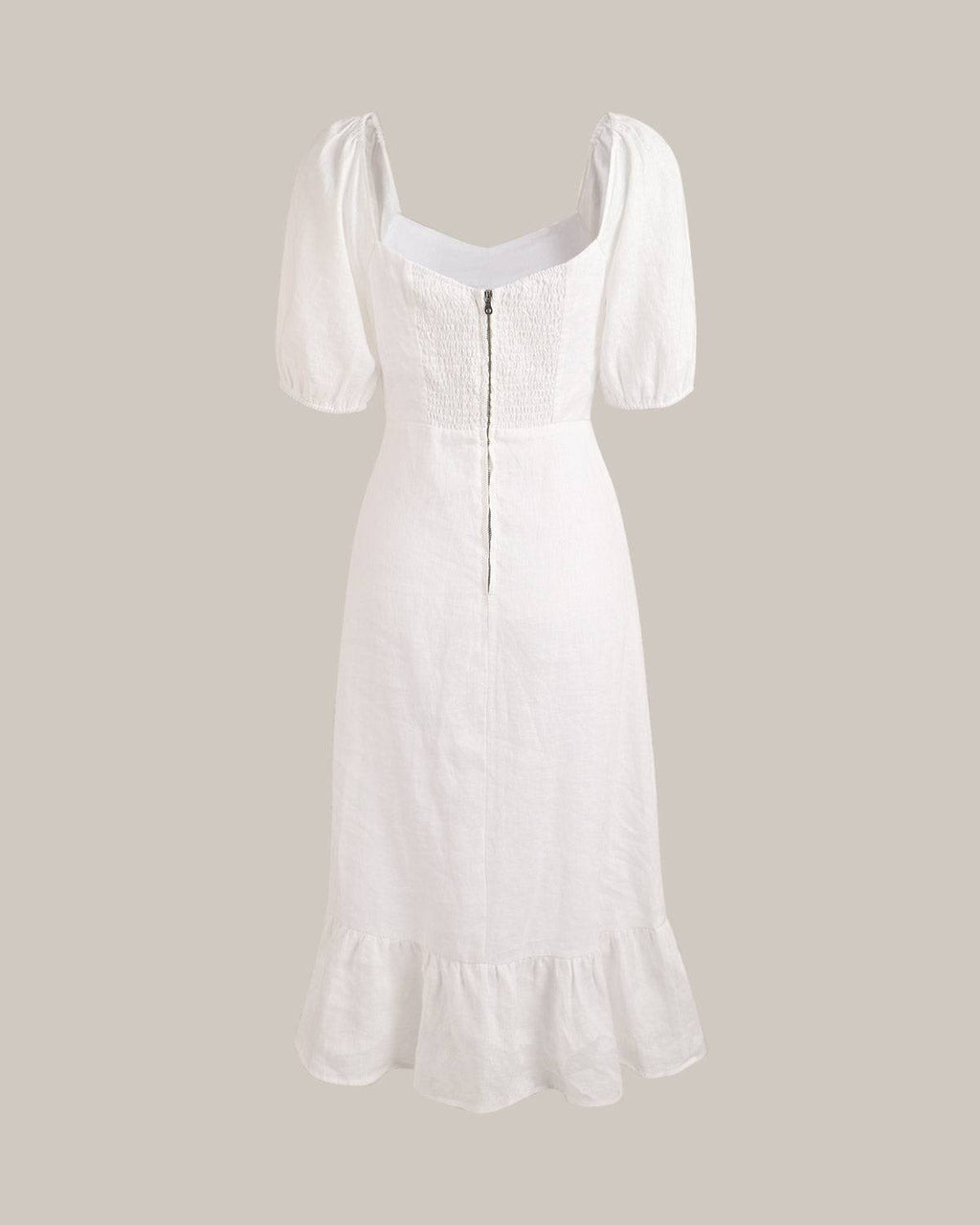 DIANA | Vestido con mangas abullonadas y bajo con abertura