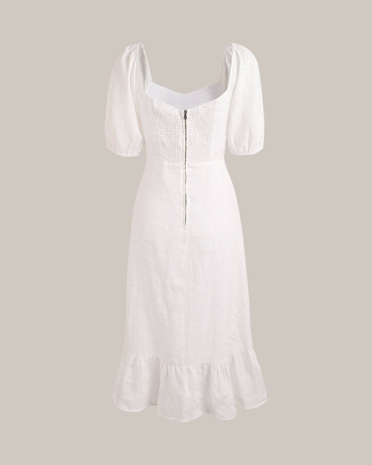 DIANA | Vestido con mangas abullonadas y bajo con abertura